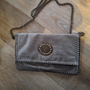 Boutique style bag with recycled LV tag